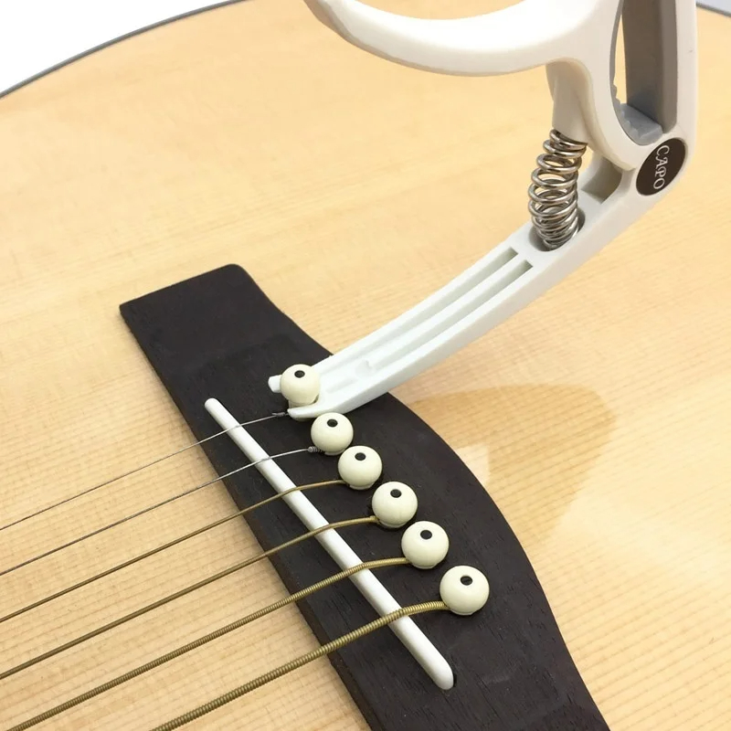 Capo gitar plastik 6 dawai ele - Guitar Capo Clip ulasan dan harga